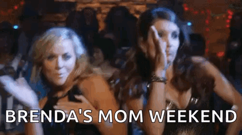 Two Women Are Dancing In A Club And The Words Brenda 'S Mom Weekend Are Written On The Screen . GIF