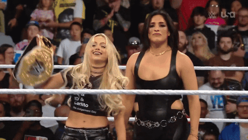 Two Women Are In A Wrestling Ring And One Has A Shirt That Says Carito GIF
