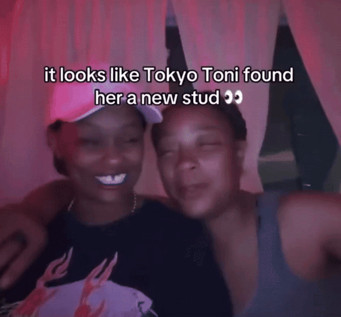 two women are kissing and the caption says it looks like tokyo toni found her a new stud