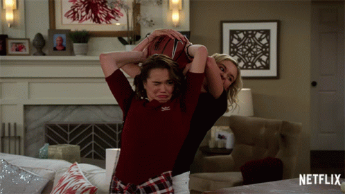 Women Playing Basketball In Living Room GIF