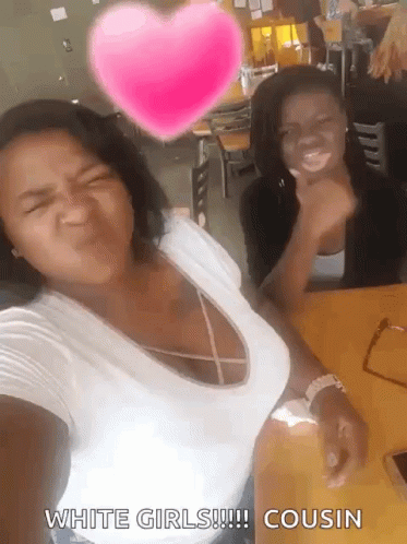Two Women Are Posing For A Picture With A Pink Heart Above Them That Says White Girls !!! Cousin GIF