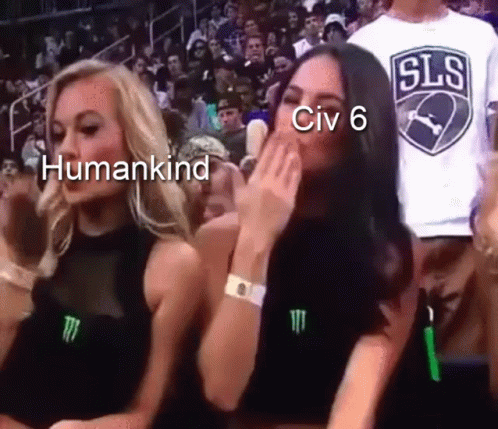 Two Women Are Sitting In A Crowd And One Of Them Is Wearing A Shirt That Says ' Sls ' On It GIF