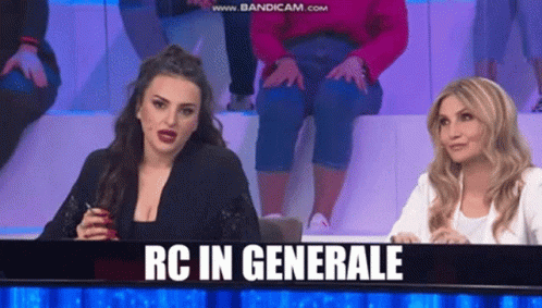 Two Women Are Sitting In Front Of A Sign That Says Rc In Generale On It GIF