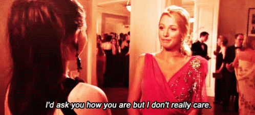 Two Women Are Standing Next To Each Other In A Room And One Of Them Is Talking To The Other . GIF