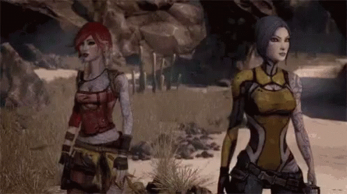 Two Women Are Standing Next To Each Other On A Beach . GIF