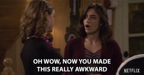 Two Women Are Standing Next To Each Other With The Words Oh Wow Now You Made This Really Awkward GIF