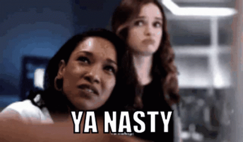Two Women Are Standing Next To Each Other With The Words Ya Nasty Written On The Bottom GIF