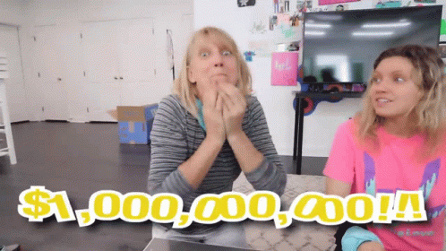 Two Women At Table One Wearing Pink I Love You T-Shirt GIF