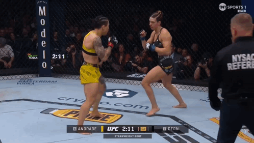Two Women Fighting In Boxing Ring Score 2:11 GIF