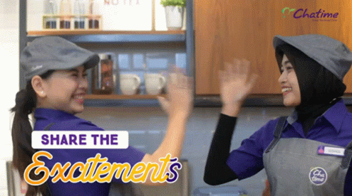 Two Women Giving Each Other A High Five With The Words Share The Excitements In The Background GIF