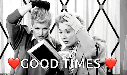 Two Women Holding Book Good Times GIF