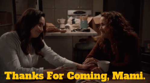 Two Women Holding Hands Thanks for Coming Mami