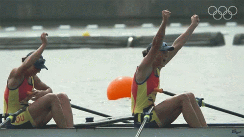 Two Women In A Rowing Boat With The Letters Ou On Their Shirts GIF