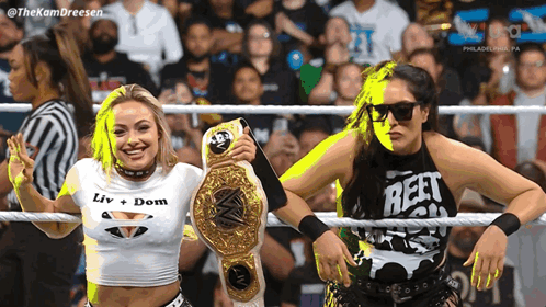 Two Women In A Wrestling Ring One Wearing A Shirt That Says Reet On It GIF