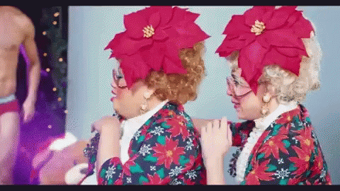 Two Women in Christmas Costumes Side by Side