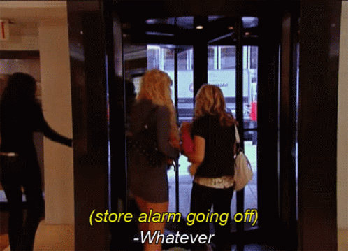 Two Women In Doorway During Alarm GIF