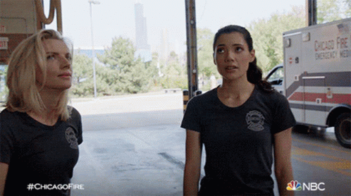 Two Women In Front Of Ambulance Saying Chicago Fire GIF