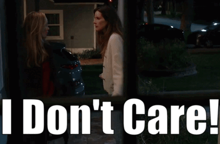 Two Women in Front of House Saying I Don't Care