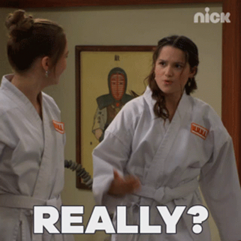 Two Women In Karate Uniforms Are Standing Next To Each Other And One Of Them Is Asking The Other " Really " GIF