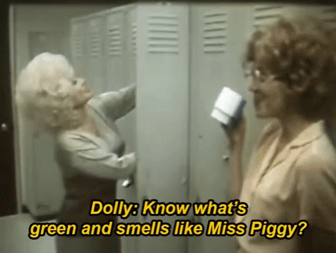 Two Women In Locker Room Dolly Know What's Green And Smells Like Miss Piggy GIF