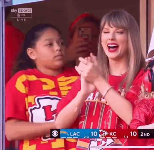 Two Women in Stands With SARS Super Screen