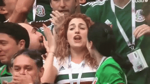 Two Women Kissing at Soccer Stadium