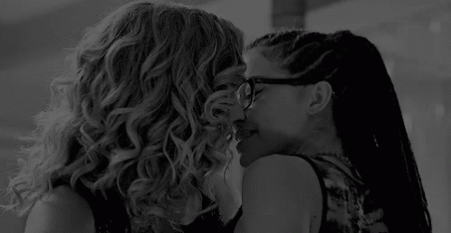 Two Women Kissing In Black And White GIF