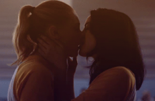 Two Women Kissing In Dark Room GIF