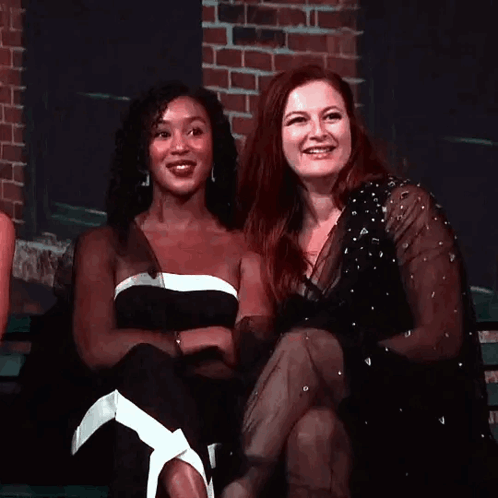 Two Women Laughing On Bench GIF
