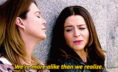 Two Women Leaning Saying We're More Alike