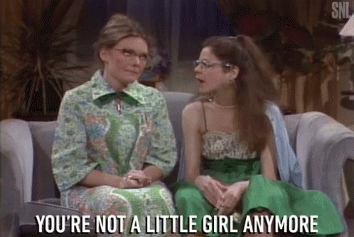 Two Women On Couch Saying You're Not A Little Girl Anymore GIF