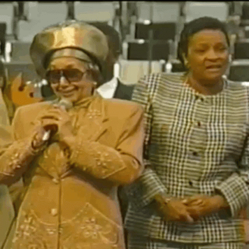 Two Women One Holding Microphone
