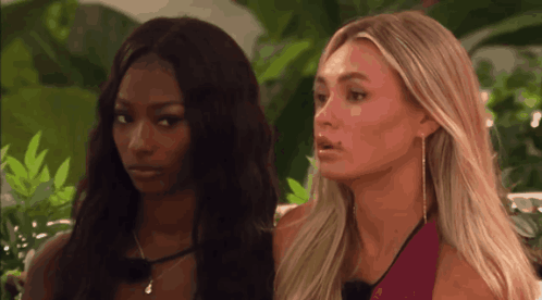 Two Women One in Red Tank Top