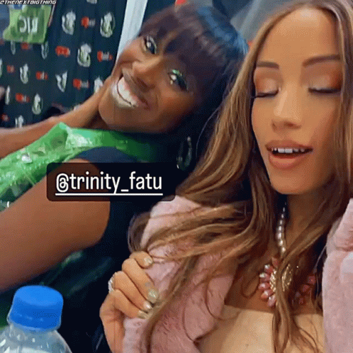 Two Women Posing With Name trinity_fautu