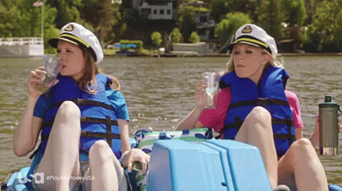 Two Women Row The Boat With Their Feet GIF