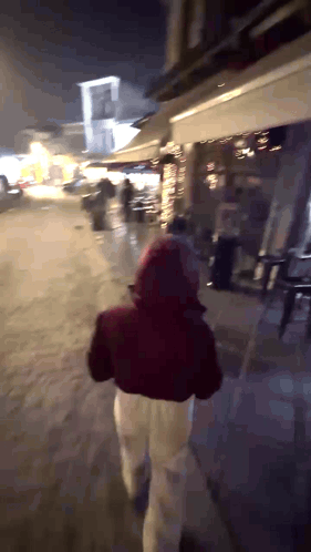 Two Women Running In Woods One With Heart Shirt GIF
