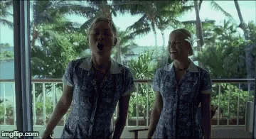 Two Women Singing on Balcony