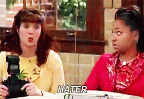 Two Women Sitting At Table Hater GIF
