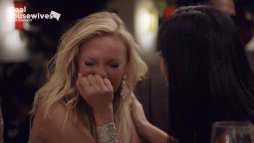 Two Women Sitting At Table Saying Real Housewives GIF