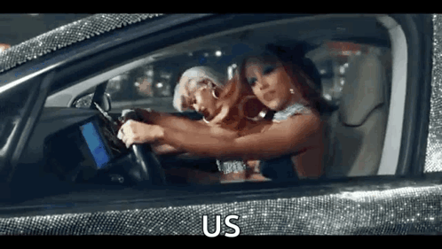 Two Women Sitting in Car With Diamonds