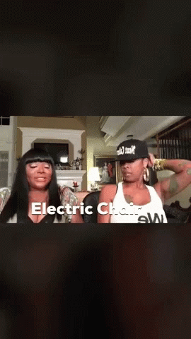 Two Women Sitting in Living Room Electric Chair