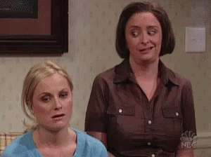 Two Women Sitting In Living Room GIF