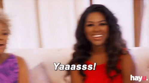 Two Women Sitting On Couch Saying Yaaasss GIF