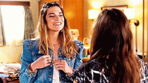 Two Women Smiling at Each Other