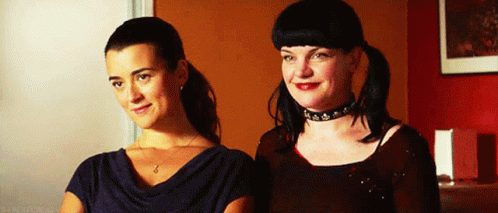 Two Women Smiling Together