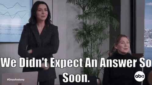 Two Women Standing In Front Of A Laptop With The Words We Did N't Expect An Answer So Soon Below Them GIF
