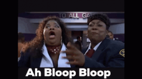 Two Women Standing Near Ah Bloop Bloop Sign GIF