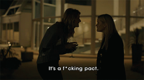 Two Women Standing Next To Each Other Saying It's A F*cking Pact GIF