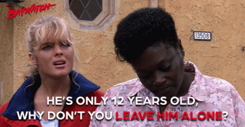 Two Women Standing Next To Each Other With The Words " He 'S Only 12 Years Old Why Don T You Leave Him Alone " GIF