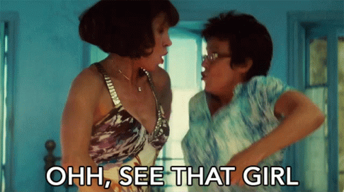 Two Women Standing Next To Each Other With The Words Ohh See That Girl Written Below Them GIF